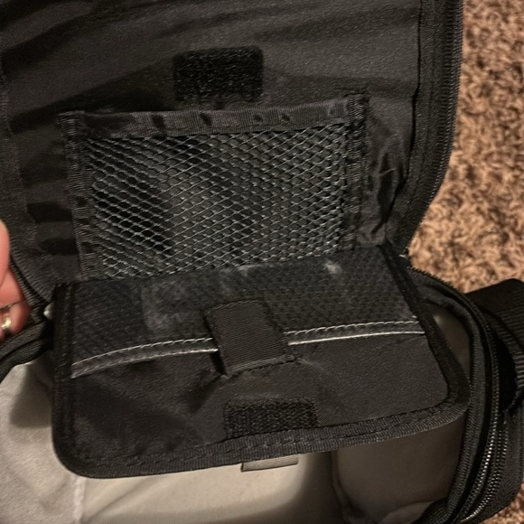 Sony black camera bag with a lot of pockets and adjustable strap - Picture 3 of 4